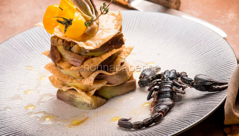 Lasagnetta croccante di scorpione con ragù di carciofi e pomodorini arrosto